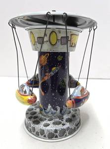 lot 102 image: Tin Litho Atomic Spinning Space Toy