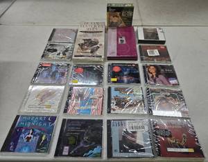 lot 241 image: Group of Brand New Sealed Music CDs & Box Sets