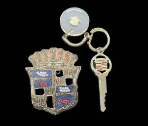 lot 267 image: Orig Vintage 1930s-40s Handmade Cadillac Patch & Vintage Keychain