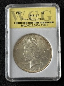 lot 9 image: 1923 Peace Dollar WCG MS67