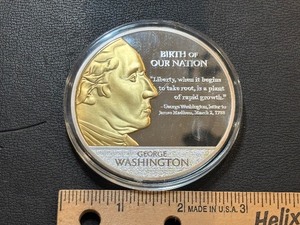 lot 64 image: Jumbo Mount Rushmore Silver and Gold Layered Medallion