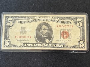 lot 191 image: 1963 Red Seal $5 Dollar Note Laminated