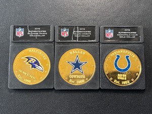 lot 87 image: 2016 Fiji NFL Dollar Coins