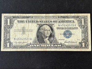 lot 109 image: 1957 Blue Seal $1 Dollar Silver Certificate