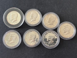 lot 128 image: Kennedy Half Dollars