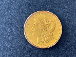 lot 152 image: 1884 Morgan Dollar Sealed in Plastic Colorized Eagle