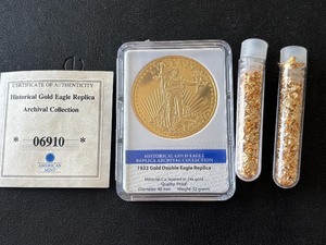 lot 179 image: Double Eagle Replica and Tubes of Gold Flakes