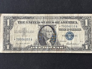 lot 4 image: 1957 Blue Seal $1 Dollar Silver Certificate Star Note