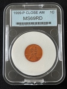 lot 11 image: 1999 Lincoln Cent MS66 Red