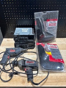lot 23 image: Splash Guards, Drills, Car Radios