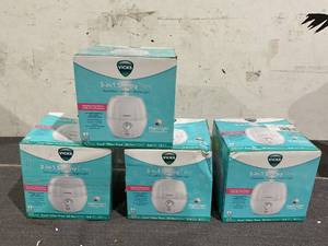 lot 101 image: LOT OF 4 Vicks 3-in-1 Sleepy Time Humidifier Diffuser Nightlight