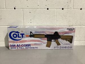 lot 550 image: Soft Air USA Colt M4A1 M4 CQBR AEG Electric Airsoft Rifle with Adjustable Hop-Up, Dark EarthTan, 453 FPS