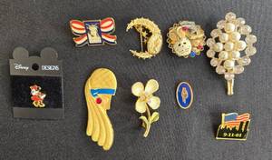 lot 30 image: Collection of Assorted Vintage Enamel and Metal Pins Including Disney and Commemorative Designs
