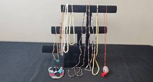 lot 55 image: Collection of Assorted Beaded and Pearl Like Necklaces with Handcrafted Pouch - display not inc