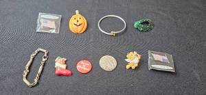 lot 57 image: Collection of Holiday and Patriotic Pins with Bracelets and Charms