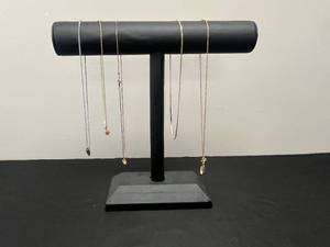 lot 112 image: Set of Elegant Necklaces featuring Gold Tone, Silver Tone, and Gem Accents - display not inc