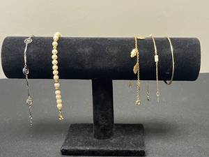 lot 120 image: Collection of Avon Bracelets in Gold and Silver Tones - display not inc