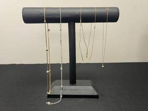 lot 131 image: Collection of Avon Necklaces with Gold and Silver Tones - display not inc