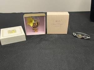 lot 135 image: Avon Special Bouquet Corsage Pin and Silver-Tone Bracelet Set