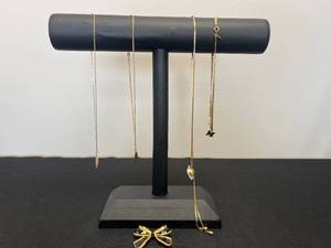 lot 155 image: Collection of VTG Avon Gold Tone Fashion Jewelry with Bow PinClasp and Butterfly Pendant - display not inc