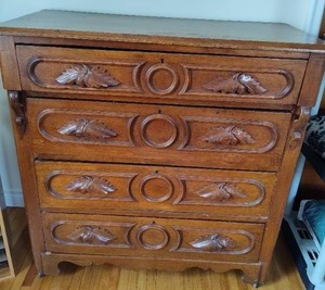 lot 4 image: Antique Hand Carved Four Drawer Dresser