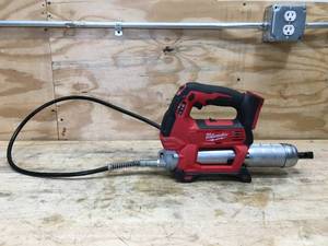 lot 11 image: Milwaukee Grease Gun Model # 2646-20