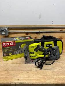 lot 96 image: RYOBI JM83K 6 Amp Corded AC Biscuit Joiner Kit with Dust Collector and Bag - C169