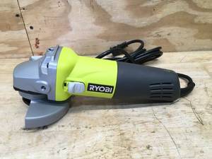 lot 28 image: RYOBI 5.5 Amp Corded 4-12 in. Angle Grinder Model # AG4031G