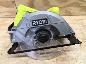 lot 29 image: RYOBI 13 Amp Corded 7-14 in. Circular Saw Model # CSB125