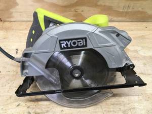 lot 77 image: RYOBI 14 Amp 7-14 in. Circular Saw Model # CSB135L