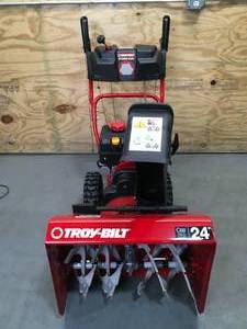Troy-Bilt Storm 24 in. 208 cc Two- Stage Gas Snow Blower with Electric Start Self Propelled Model # 31AS6KN2B23