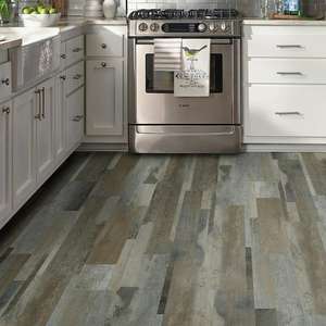 lot 40 image: TrafficMaster Grey Distressed Wood 4 MIL x Multi-Width x 36 in. L Peel and Stick Vinyl Plank Flooring (432 sqft)