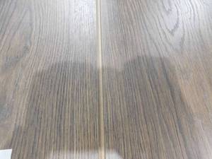 lot 24 image: Brown 8 x 48 Click Plank Laminate Water Resistant Flooring (230 sq.ft)