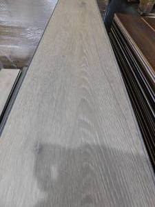 lot 31 image: Antique Tan 8 x 54 Click Plank Laminate Water Resistant Flooring (250 sq.ft)