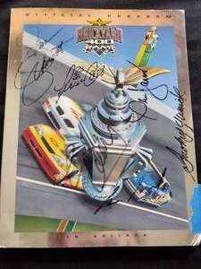 lot 107 image: Brickyard 400 august 17, 1999 official program autographed.