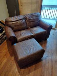 Brown leather couches with ottoman