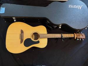 lot 22 image: Alvarez acoustic guitar RF210 NAT hard case and wall mount included