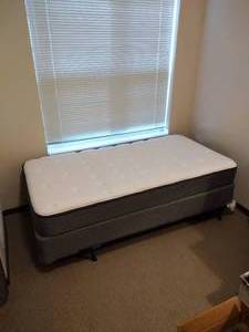 lot 13 image: New Sealy posturepedic Twin mattress with box spring and bed frame