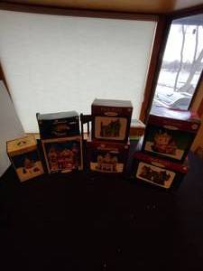 lot 227 image: Christmas valley 4 piece village collection