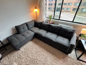 lot 37A image: Gray sectional couch with ottoman