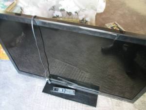 lot 227 image: 52 Sharp flat screen TV with remot...