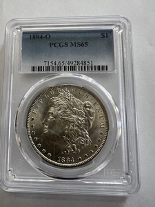 lot 9 image: 1884O Morgan Silver Dollar MS-65 PCGS