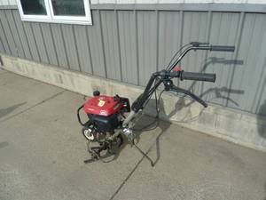 lot 72 image: Honda Tiller Model- F220