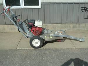 lot 84 image: Dosco Power Stump Grinder  Model# 337-13HC