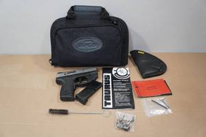 lot 25 image: Taurus PT745 Pro Millennium .45 ACP Semi-Auto Pistol - 2 Magazines
