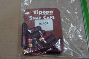 lot 104 image: 11 .45 ACP Snap Caps