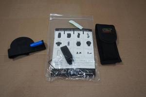 lot 134 image: Holster Belt Clips and Uncle Mikes Sidekick Magazine Pouch