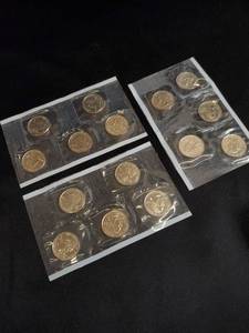 lot 32 image: Collection of 12 Commemorative Coins in Sealed Cases