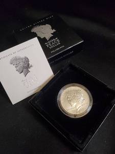 lot 57 image: 2023 Peace Silver Dollar with Certificate of Authenticity