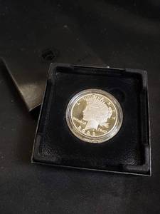 lot 62 image: Peace Dollar 1923 Coin in Display Case